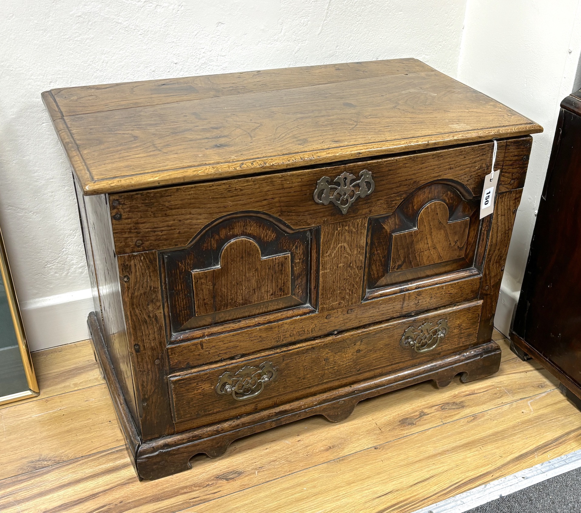 A mid 18th century Welsh oak coffer back with twin panelled front, width 65cm, depth 36cm, height 47cm.